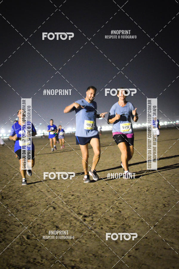 Buy your photos of the eventJovem Pan Night Run Santos on Fotop