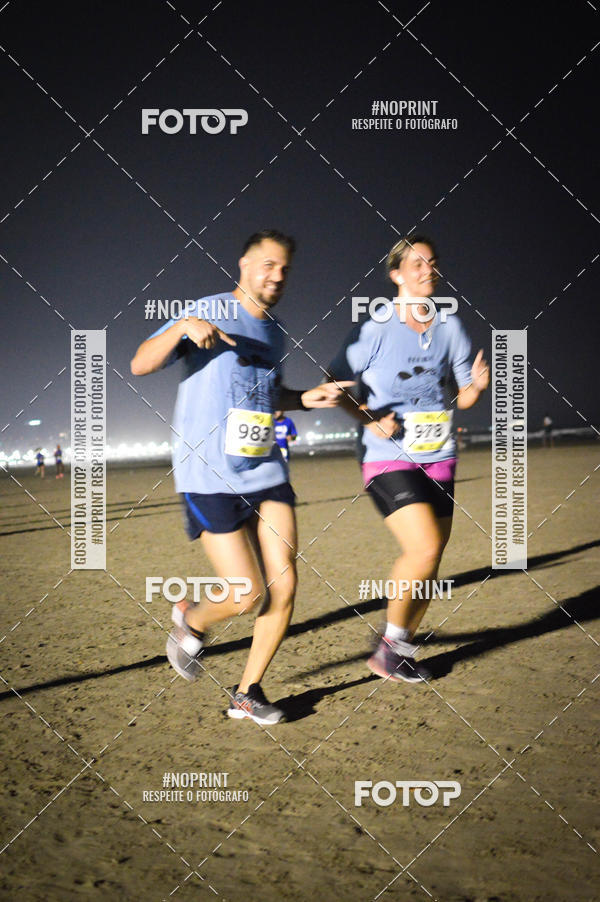 Buy your photos of the eventJovem Pan Night Run Santos on Fotop
