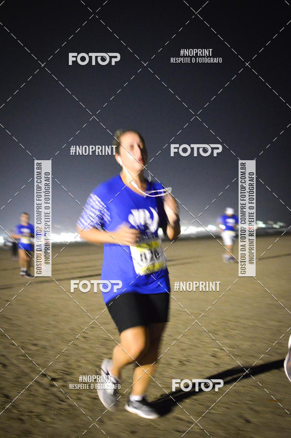 Buy your photos of the eventJovem Pan Night Run Santos on Fotop