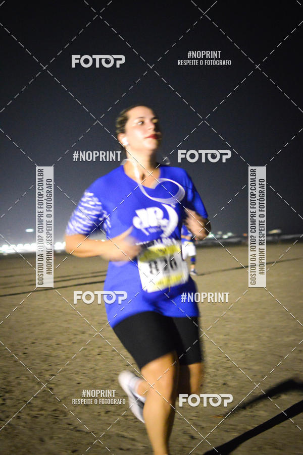 Buy your photos of the eventJovem Pan Night Run Santos on Fotop