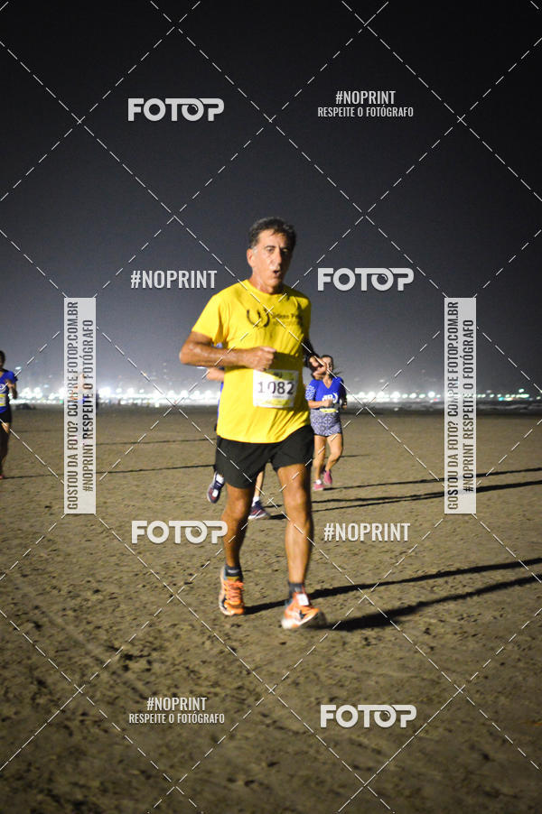 Buy your photos of the eventJovem Pan Night Run Santos on Fotop