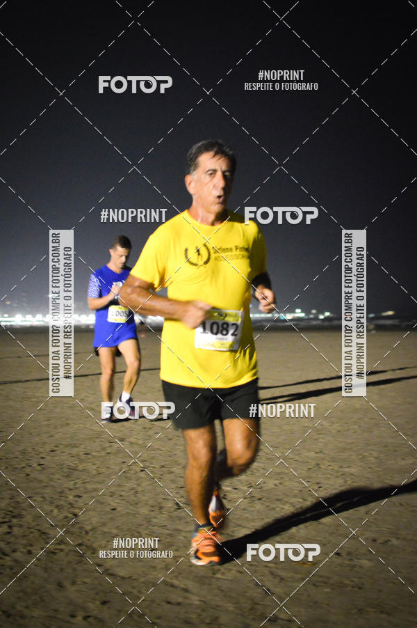 Buy your photos of the eventJovem Pan Night Run Santos on Fotop