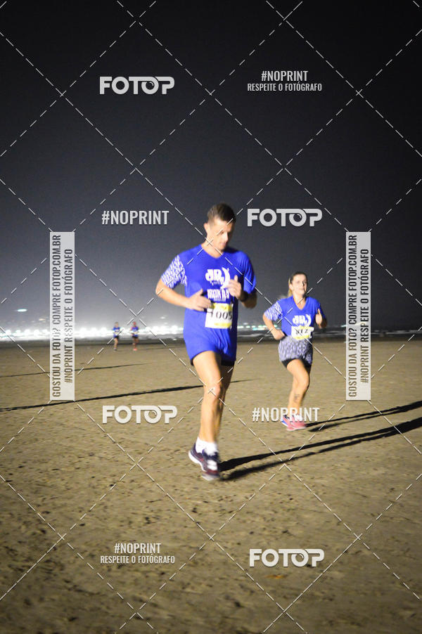 Buy your photos of the eventJovem Pan Night Run Santos on Fotop