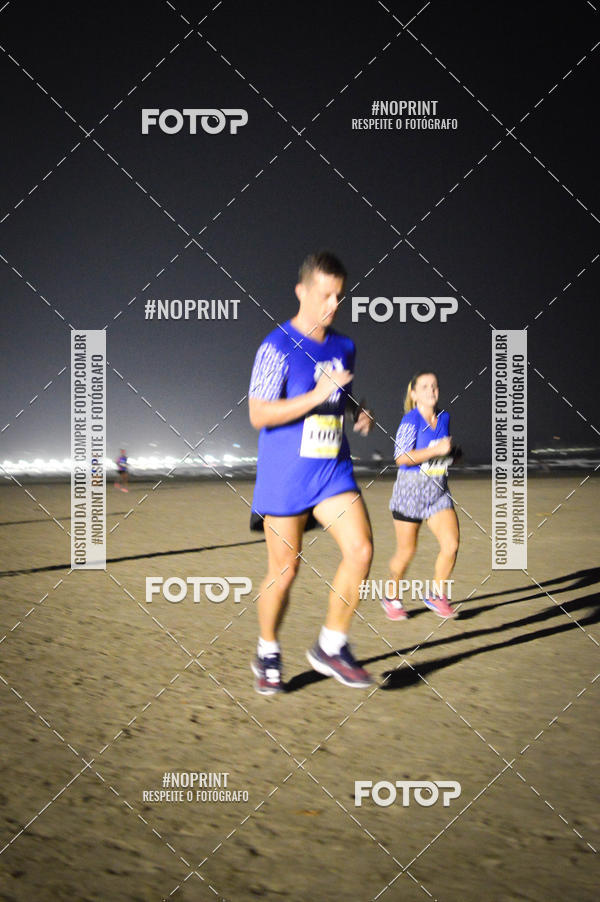 Buy your photos of the eventJovem Pan Night Run Santos on Fotop