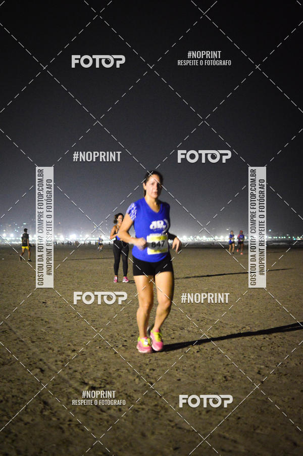 Buy your photos of the eventJovem Pan Night Run Santos on Fotop