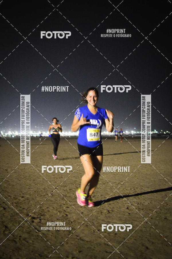 Buy your photos of the eventJovem Pan Night Run Santos on Fotop