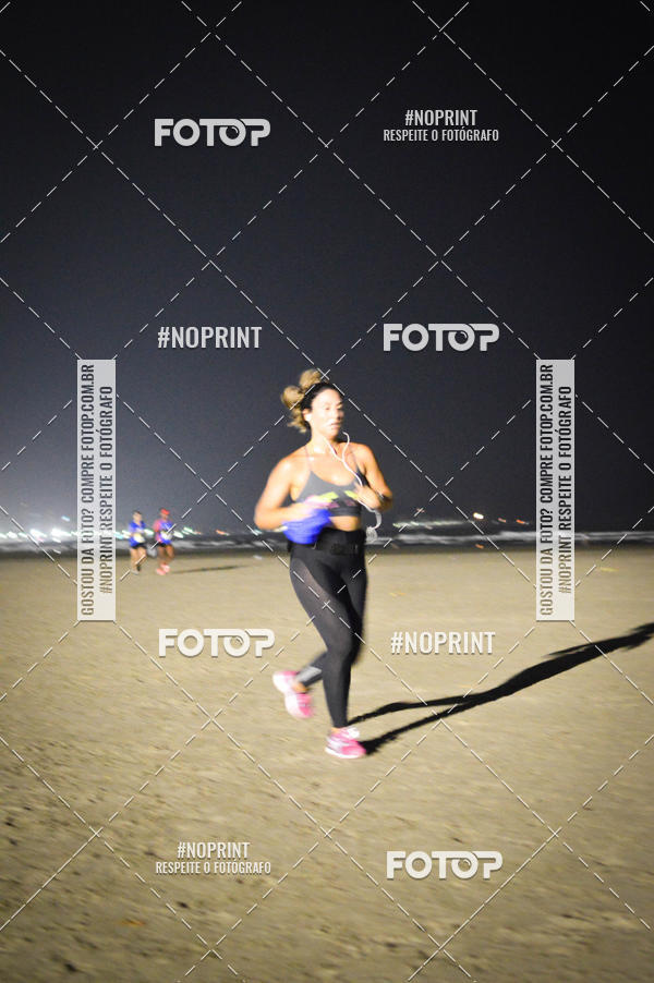 Buy your photos of the eventJovem Pan Night Run Santos on Fotop