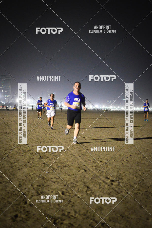 Buy your photos of the eventJovem Pan Night Run Santos on Fotop