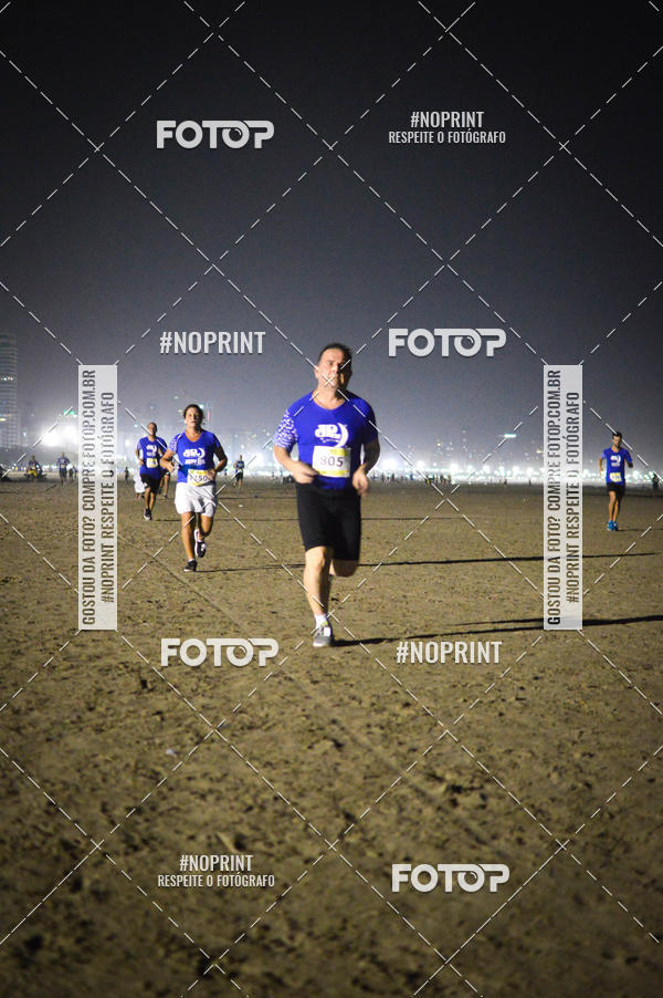Buy your photos of the eventJovem Pan Night Run Santos on Fotop