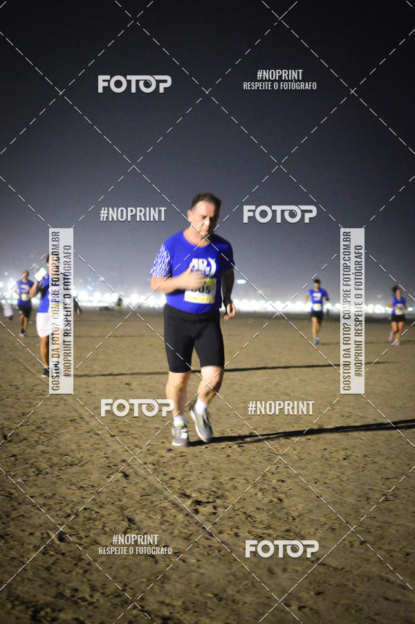 Buy your photos of the eventJovem Pan Night Run Santos on Fotop