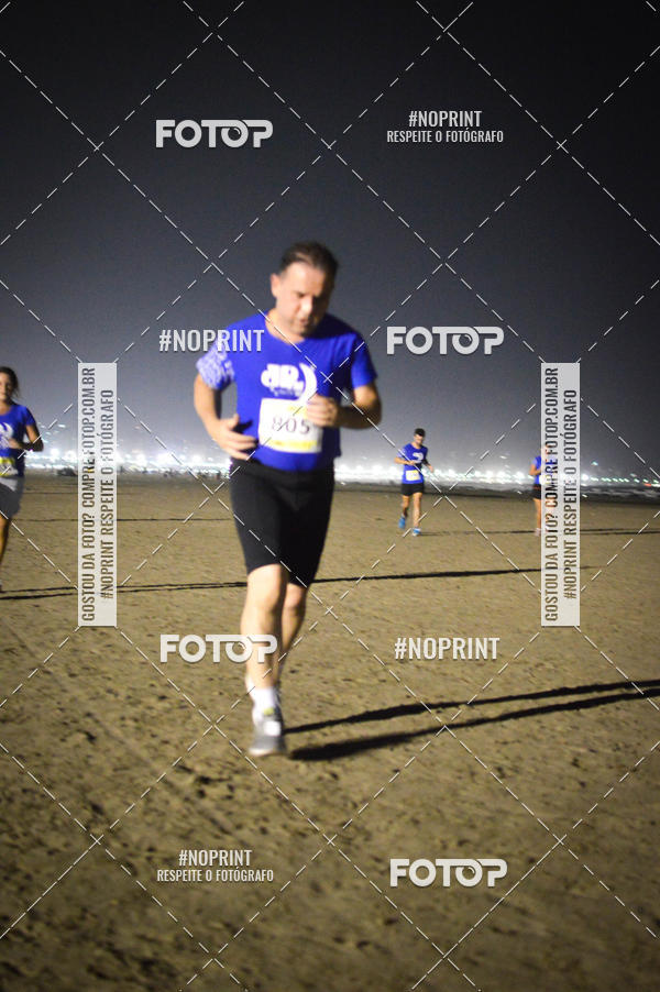 Buy your photos of the eventJovem Pan Night Run Santos on Fotop