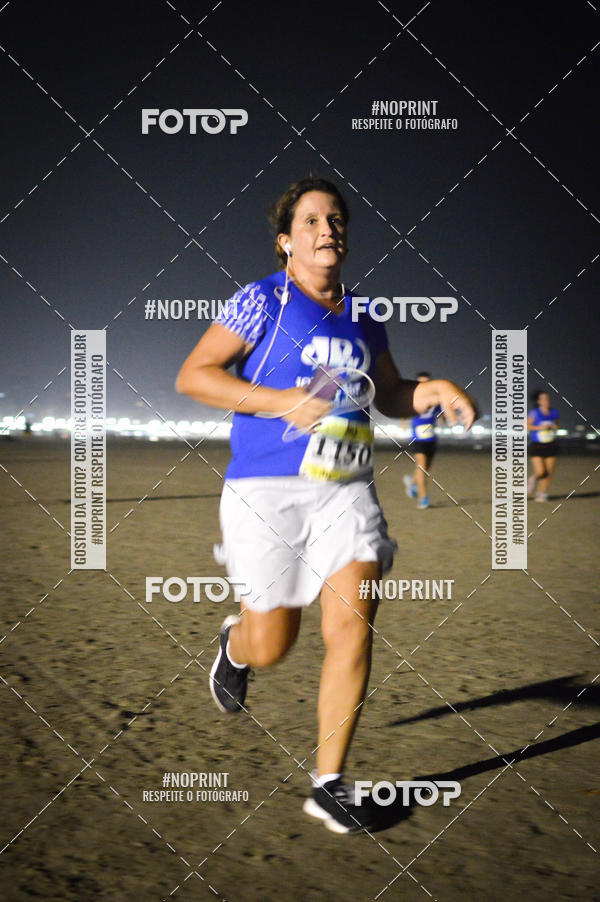 Buy your photos of the eventJovem Pan Night Run Santos on Fotop