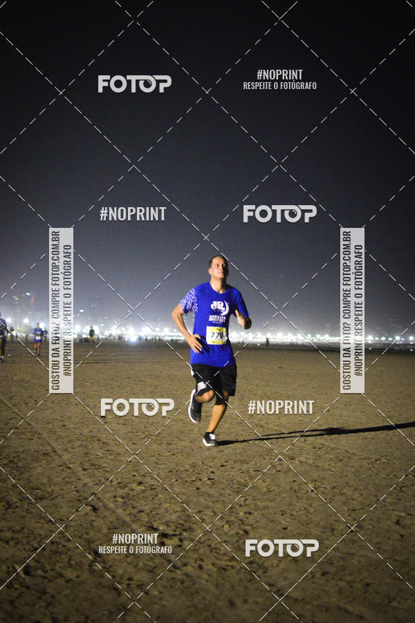 Buy your photos of the eventJovem Pan Night Run Santos on Fotop