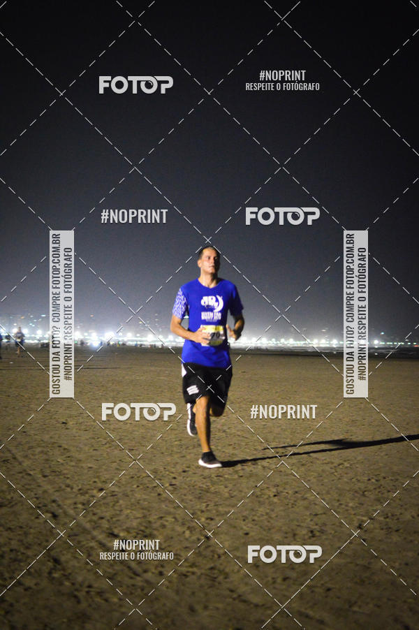 Buy your photos of the eventJovem Pan Night Run Santos on Fotop