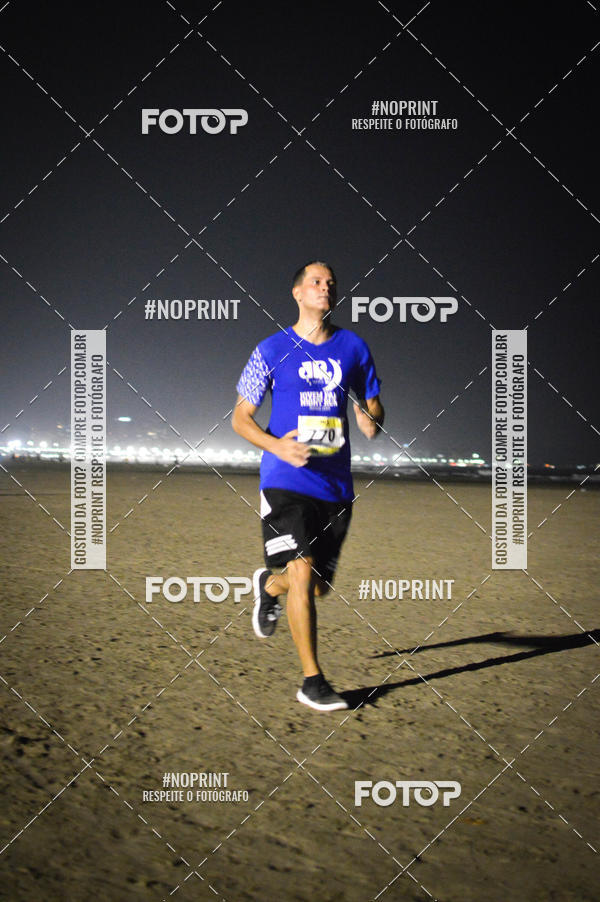 Buy your photos of the eventJovem Pan Night Run Santos on Fotop