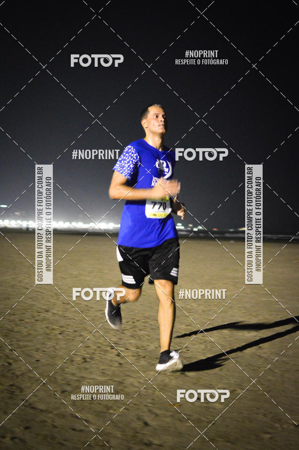 Buy your photos of the eventJovem Pan Night Run Santos on Fotop
