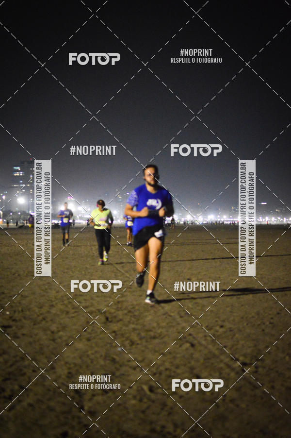 Buy your photos of the eventJovem Pan Night Run Santos on Fotop