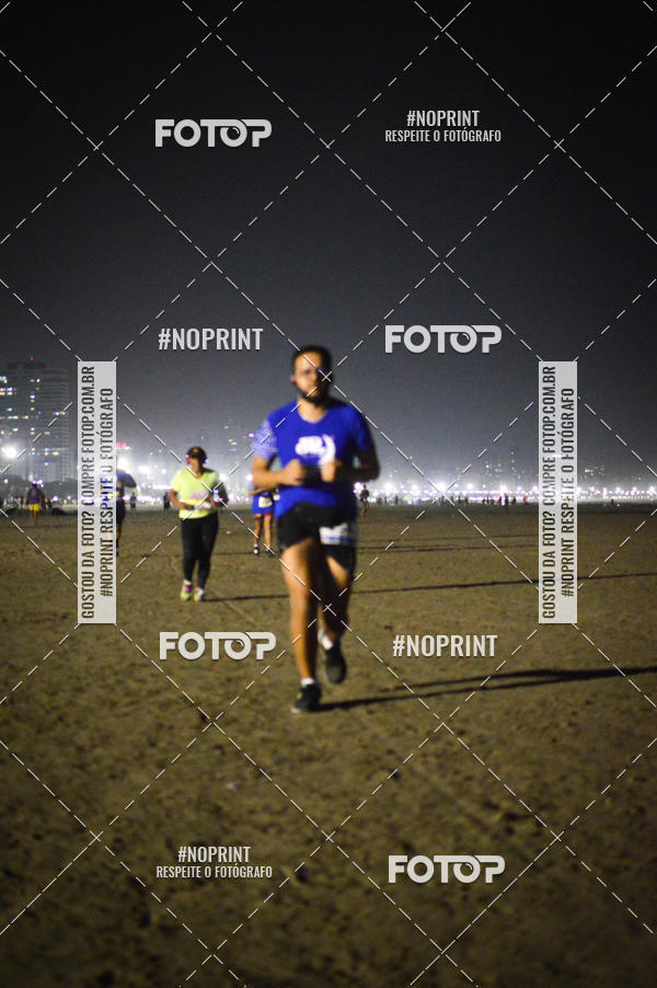 Buy your photos of the eventJovem Pan Night Run Santos on Fotop