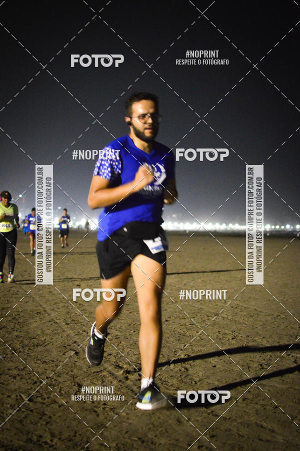 Buy your photos of the eventJovem Pan Night Run Santos on Fotop