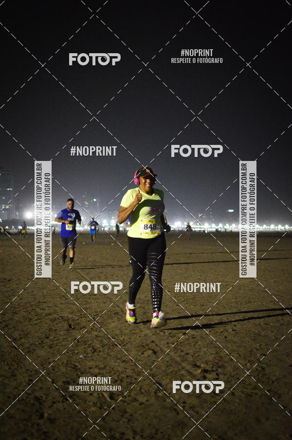 Buy your photos of the eventJovem Pan Night Run Santos on Fotop