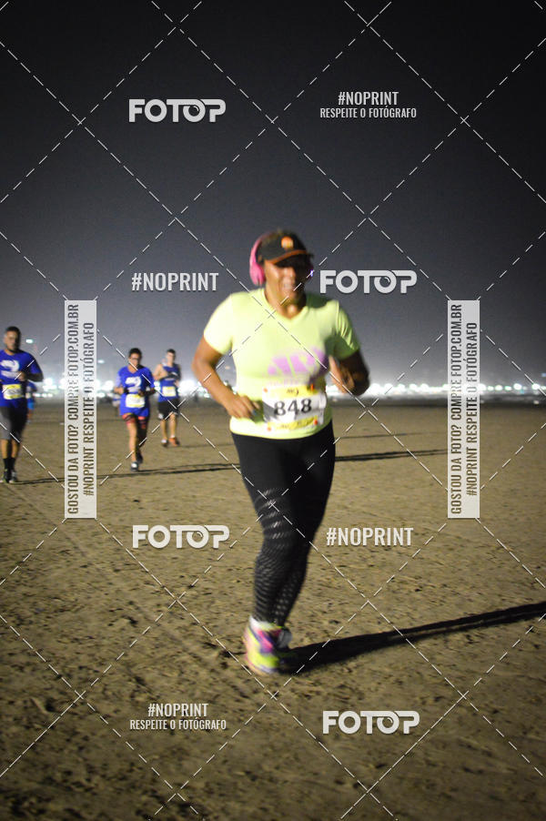 Buy your photos of the eventJovem Pan Night Run Santos on Fotop