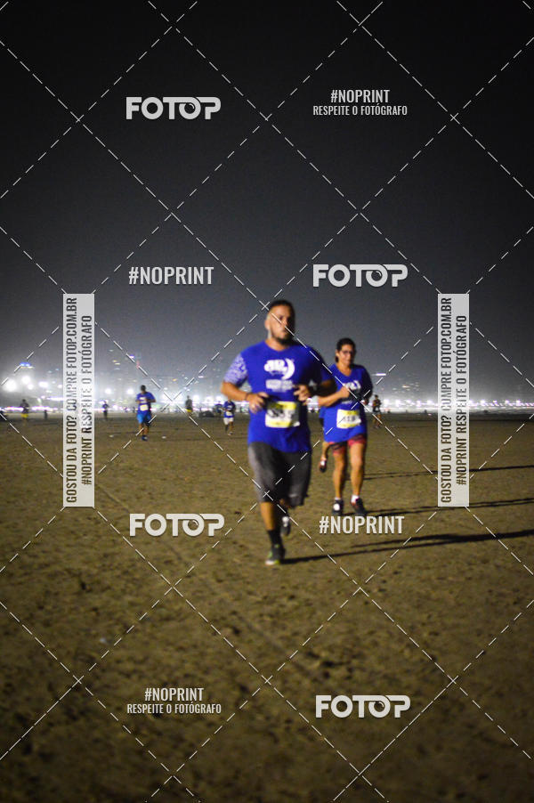 Buy your photos of the eventJovem Pan Night Run Santos on Fotop