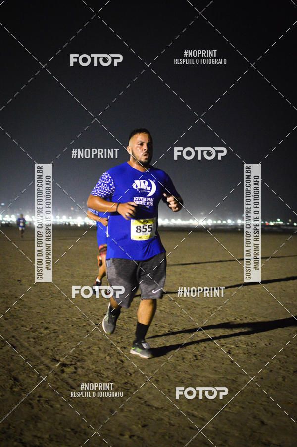 Buy your photos of the eventJovem Pan Night Run Santos on Fotop