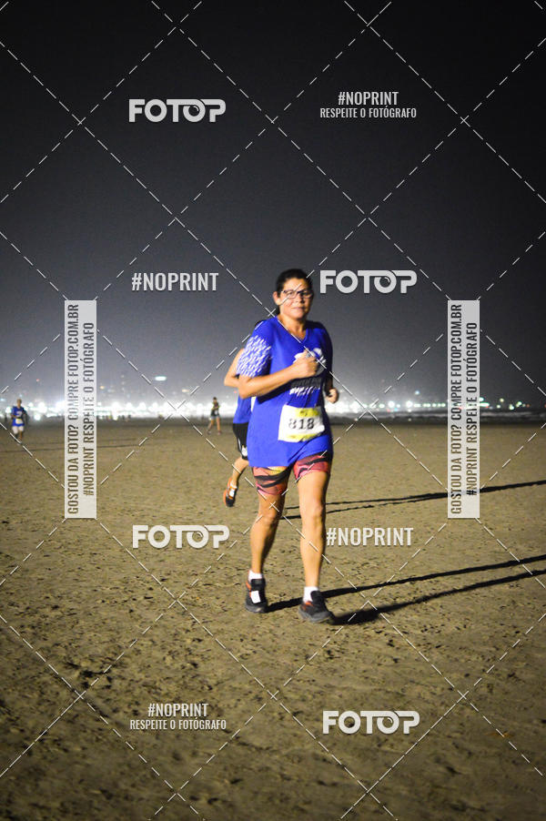 Buy your photos of the eventJovem Pan Night Run Santos on Fotop