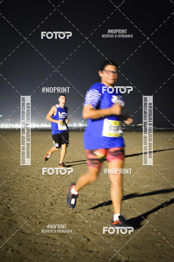 Buy your photos of the eventJovem Pan Night Run Santos on Fotop