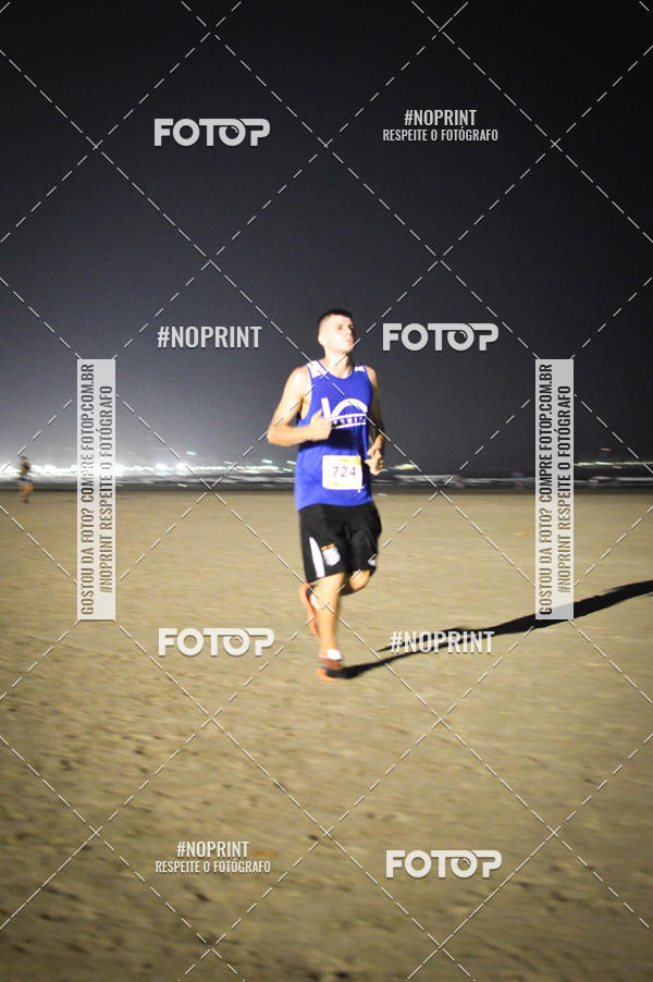 Buy your photos of the eventJovem Pan Night Run Santos on Fotop