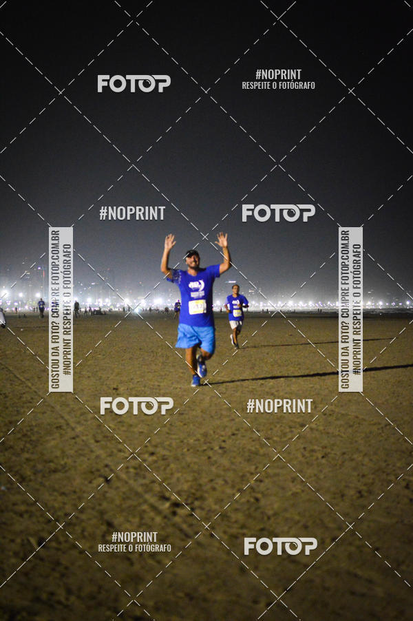 Buy your photos of the eventJovem Pan Night Run Santos on Fotop