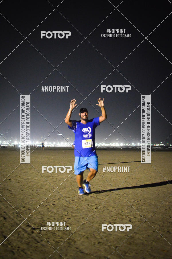 Buy your photos of the eventJovem Pan Night Run Santos on Fotop