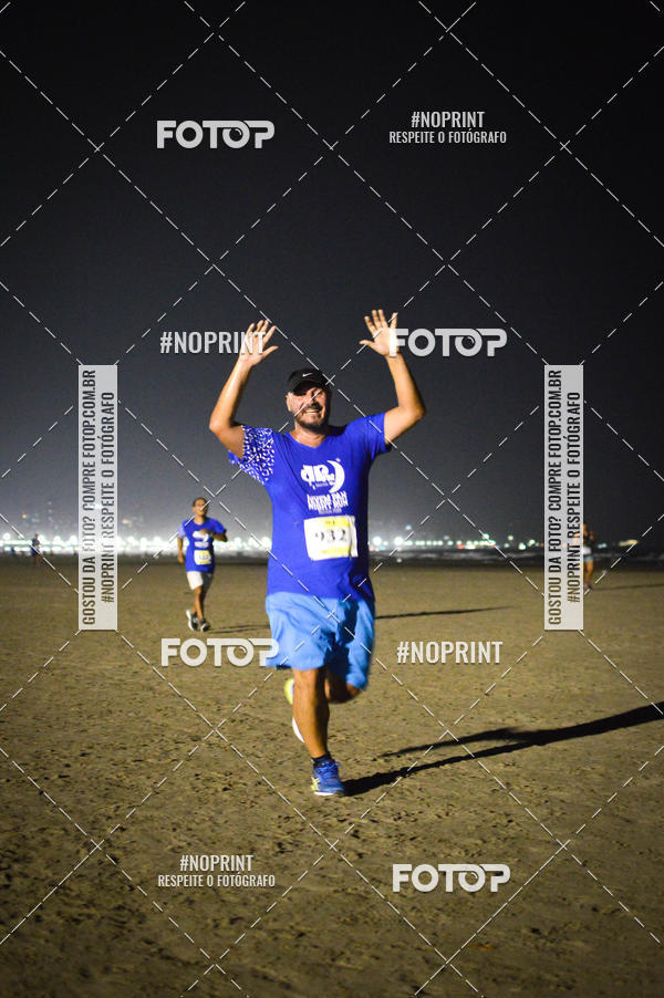 Buy your photos of the eventJovem Pan Night Run Santos on Fotop