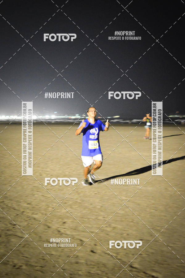 Buy your photos of the eventJovem Pan Night Run Santos on Fotop