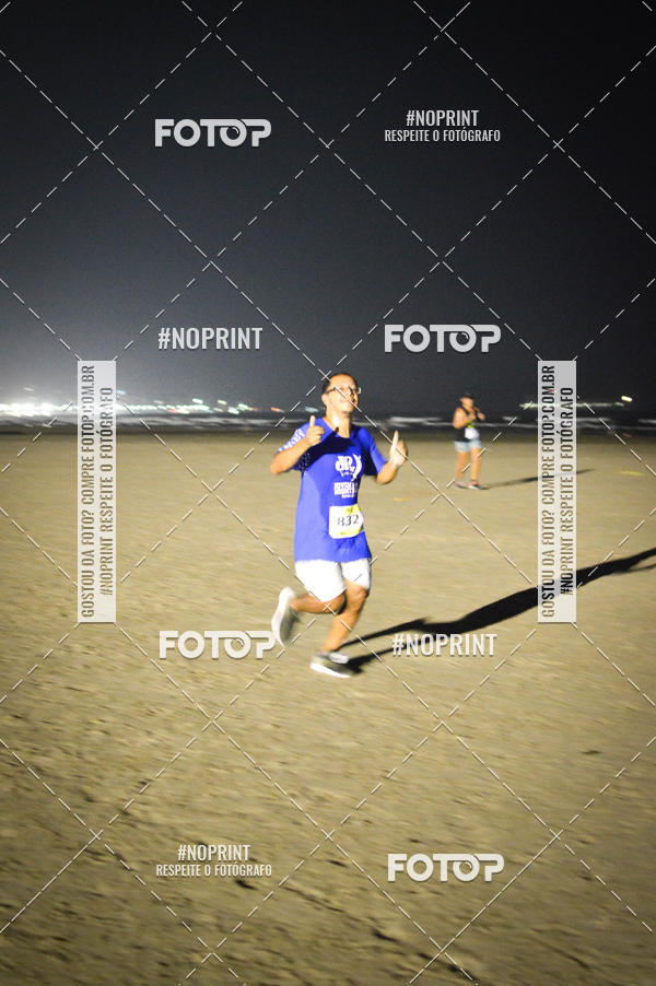 Buy your photos of the eventJovem Pan Night Run Santos on Fotop