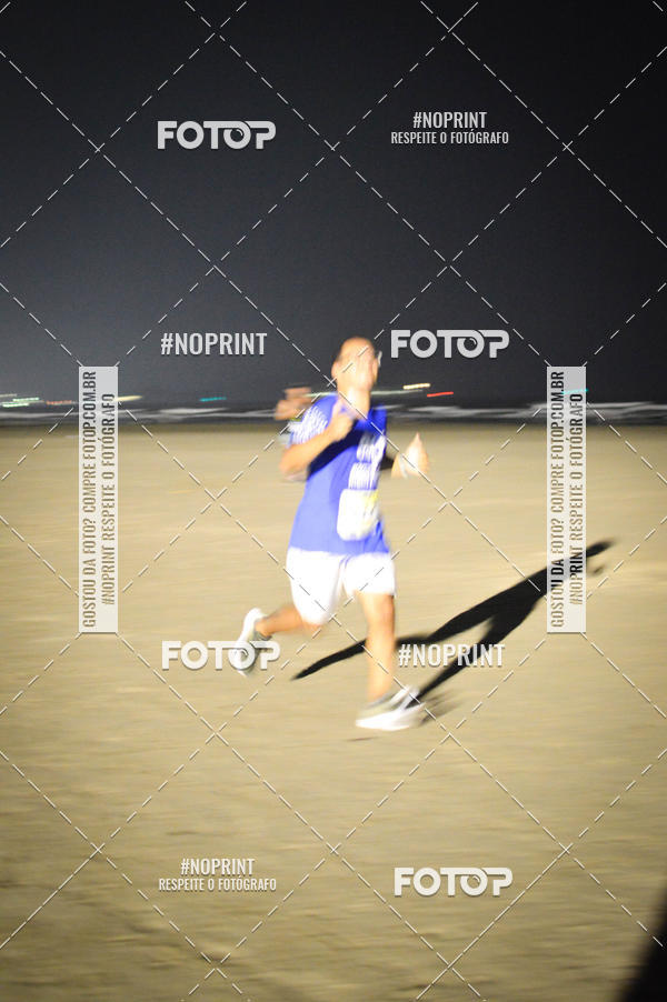 Buy your photos of the eventJovem Pan Night Run Santos on Fotop