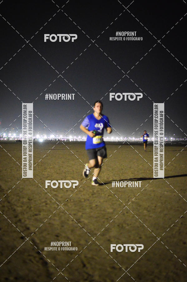 Buy your photos of the eventJovem Pan Night Run Santos on Fotop