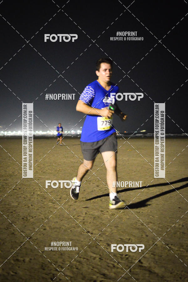 Buy your photos of the eventJovem Pan Night Run Santos on Fotop