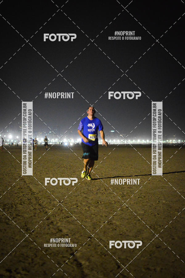 Buy your photos of the eventJovem Pan Night Run Santos on Fotop