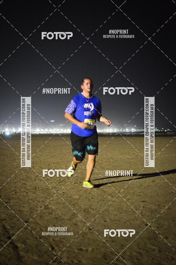 Buy your photos of the eventJovem Pan Night Run Santos on Fotop