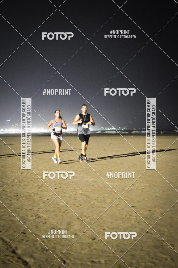 Buy your photos of the eventJovem Pan Night Run Santos on Fotop