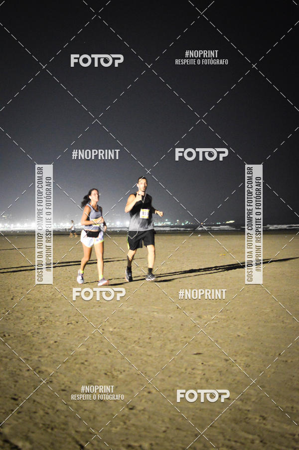 Buy your photos of the eventJovem Pan Night Run Santos on Fotop