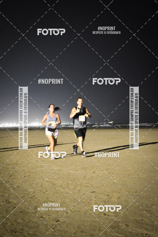 Buy your photos of the eventJovem Pan Night Run Santos on Fotop