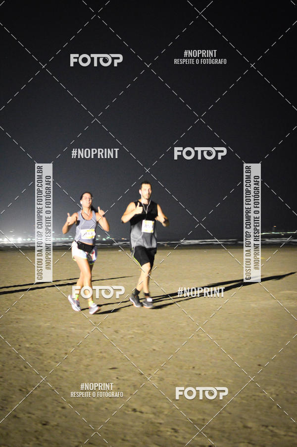 Buy your photos of the eventJovem Pan Night Run Santos on Fotop