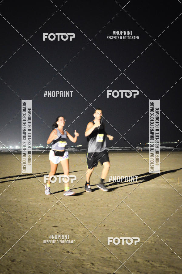 Buy your photos of the eventJovem Pan Night Run Santos on Fotop
