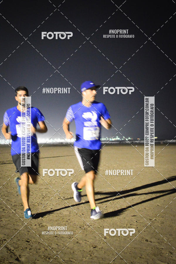 Buy your photos of the eventJovem Pan Night Run Santos on Fotop