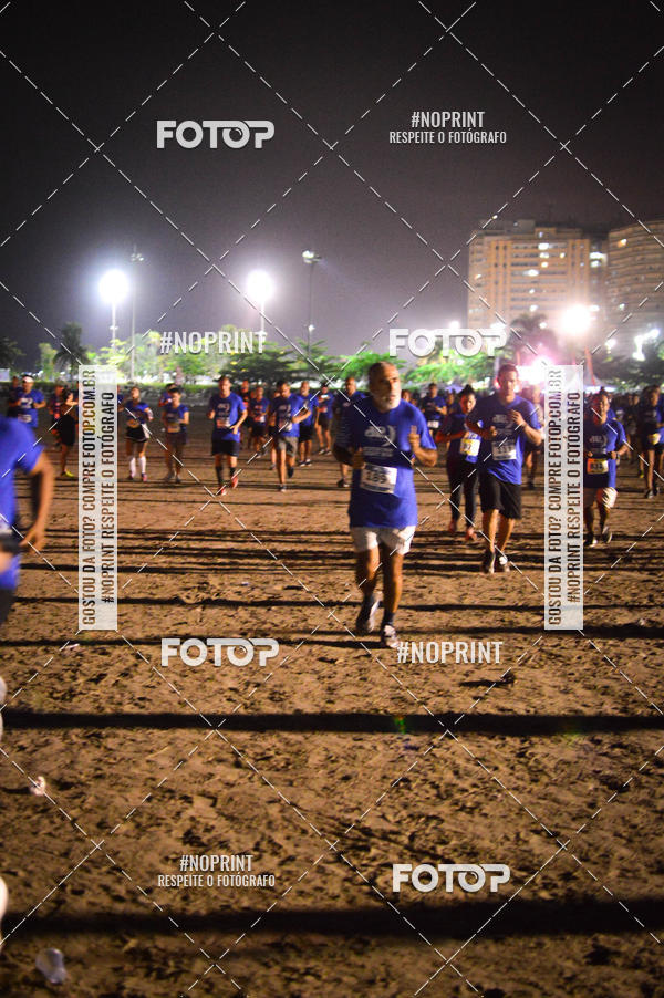 Buy your photos of the eventJovem Pan Night Run Santos on Fotop