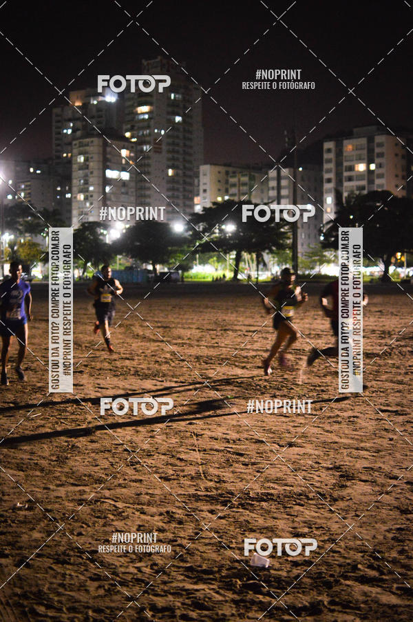 Buy your photos of the eventJovem Pan Night Run Santos on Fotop