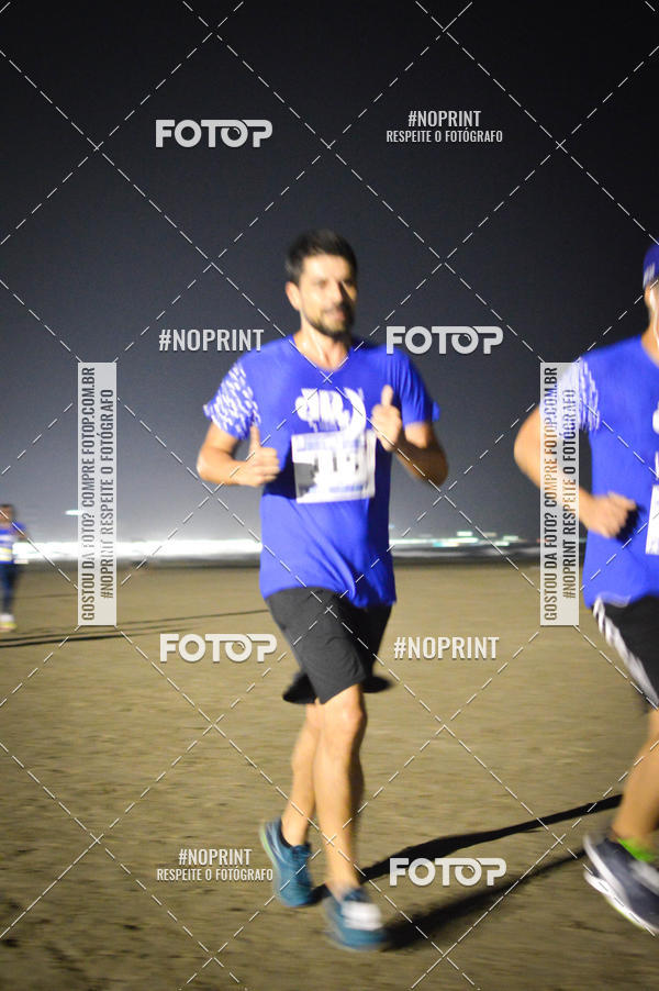 Buy your photos of the eventJovem Pan Night Run Santos on Fotop