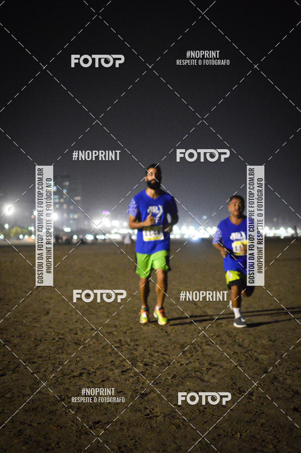 Buy your photos of the eventJovem Pan Night Run Santos on Fotop